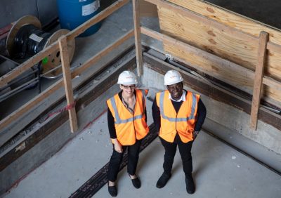 Emily Sarver and Festus Animah in the mock mine pits currently under construction in Holden Hall.